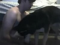 Amateur guy coaxes his large back dog to fuck him in the ass